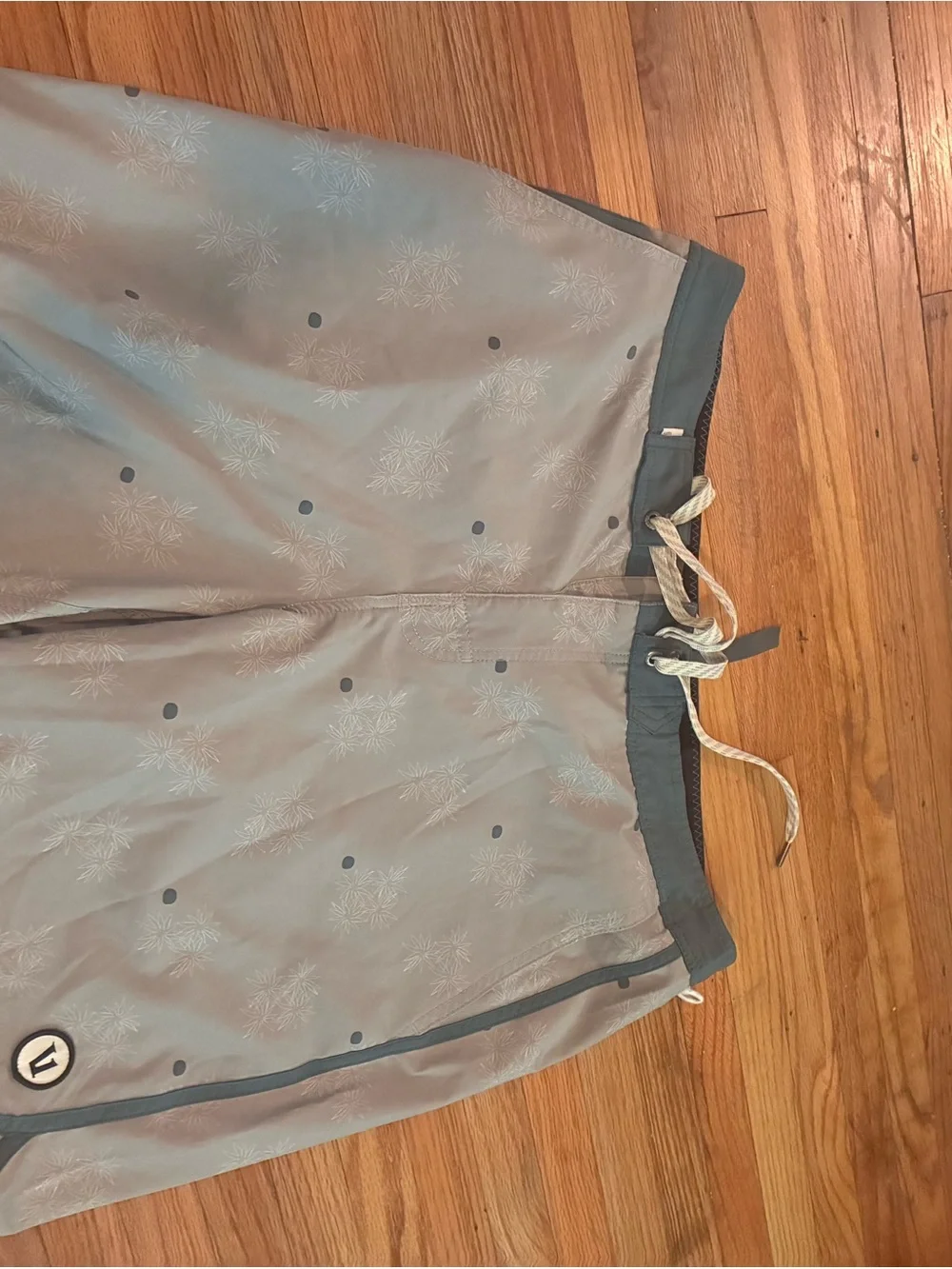 Vuori Light Gray Swim Shorts with Navy Trim